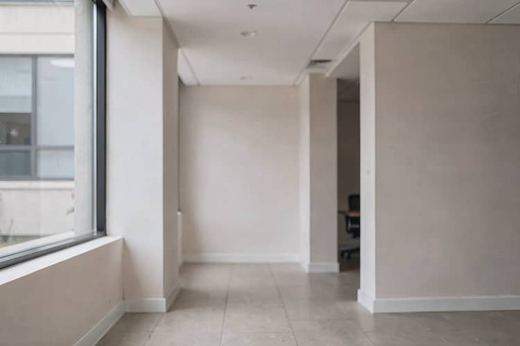 MiCA compliance requirements — architectural detail of the building interior, no signage