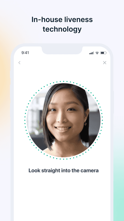 Sumsub liveness check screen prompting the user to center their face for a selfie scan